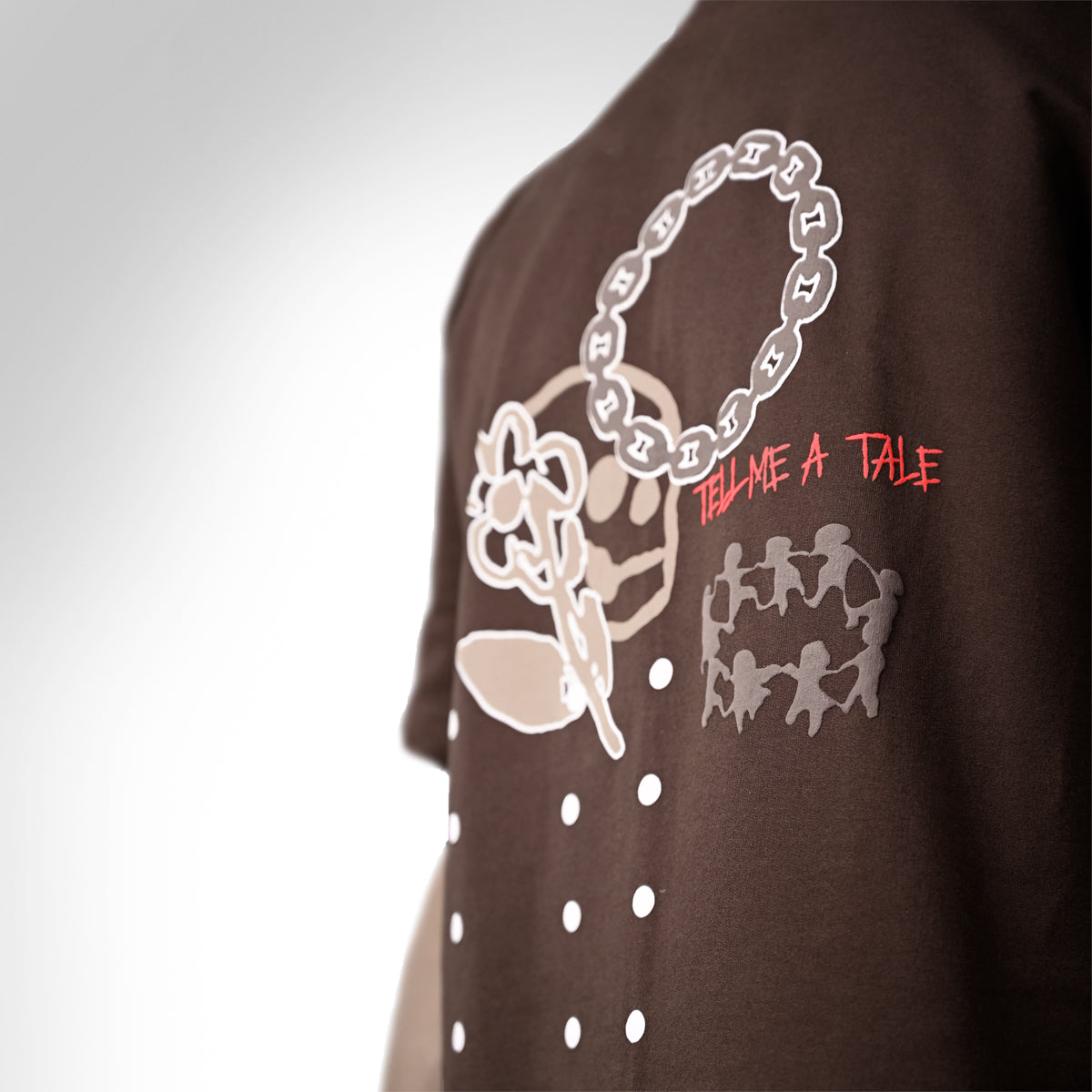 The print is a hand made sketch finished with screen printing & puff techniques to give the t-shirt an elevated feel. Also features a glow in the dark outline. 260 GSM Terry Fabric.