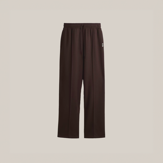 Dark brown wide-leg pants with an elastic waistband and drawstring, displayed against a plain light background.