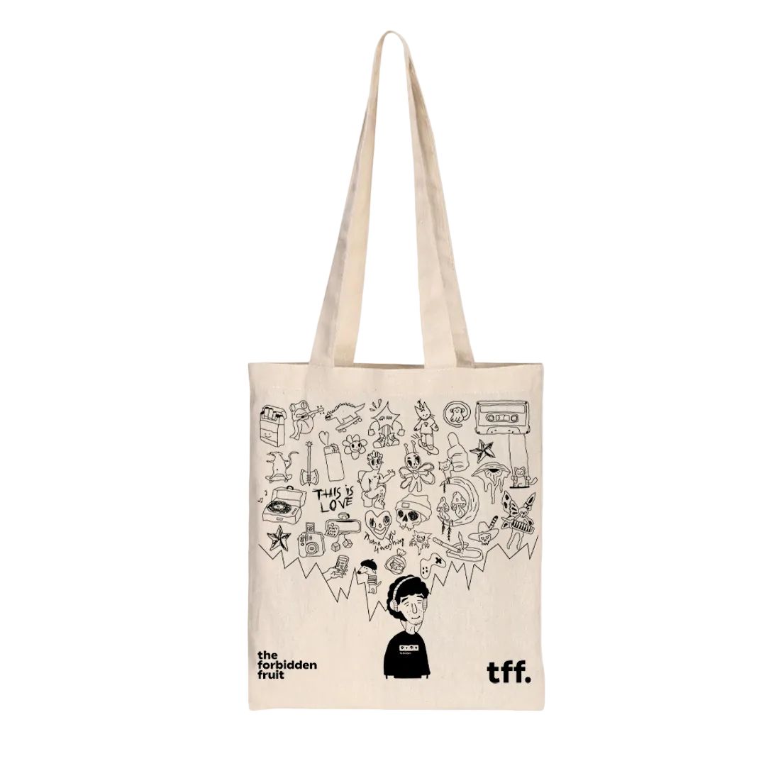 Canvas tote bag featuring playful black doodles of various objects and characters, including flowers, music notes, and a cassette tape. Text reads “the forbidden fruit” and “tff.”
