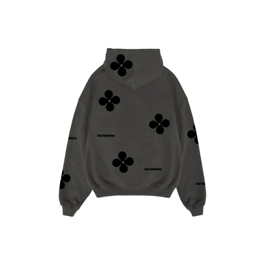 Charcoal gray hoodie featuring multiple black four-petal flower motifs printed across the front, sleeves, and pocket. The word “forbidden” appears in small black text near the chest and on one sleeve. The hoodie has a front kangaroo pocket and a relaxed, oversized fit.