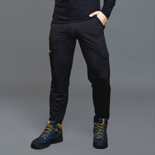 a woman in a black jacket and black pants