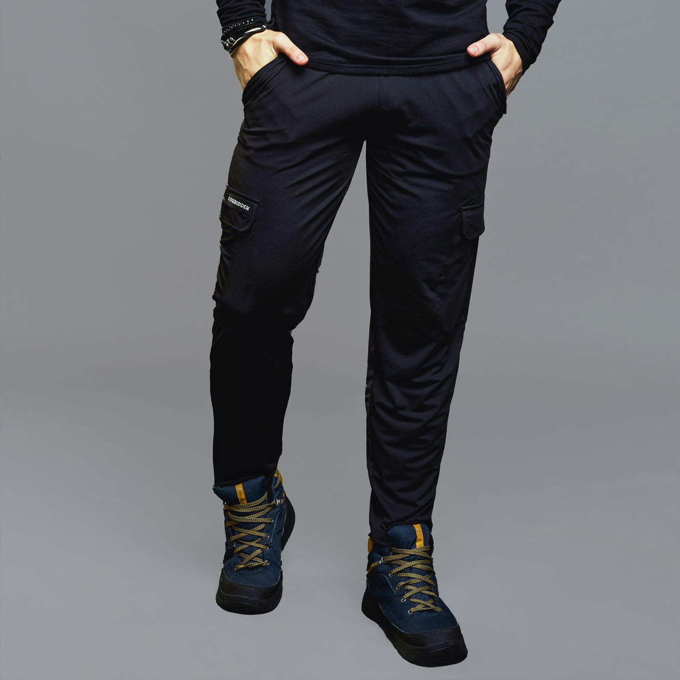 a man standing on top of a snow covered ground