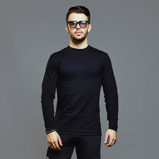 a man in a black shirt and a tie