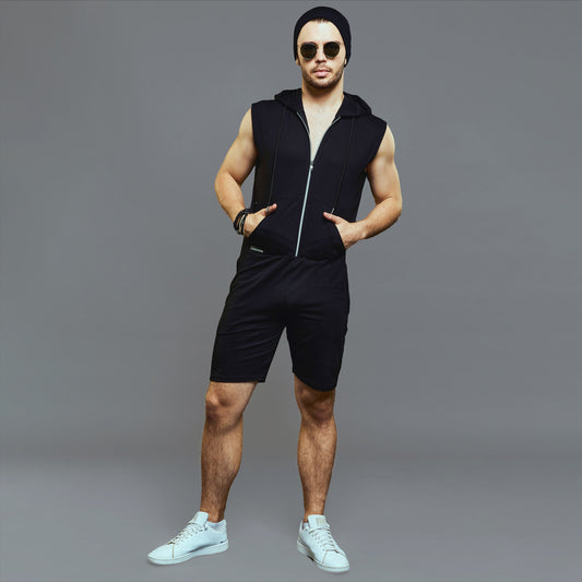 a man standing on a tennis court holding a racquet