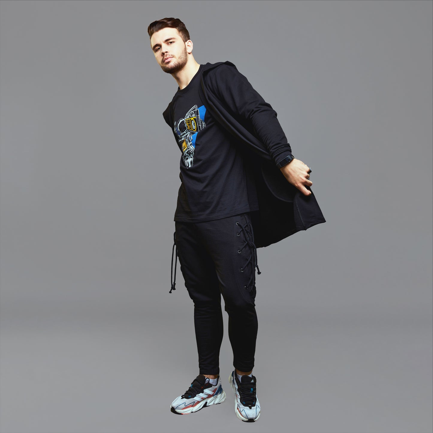 a man is standing on a pair of skis