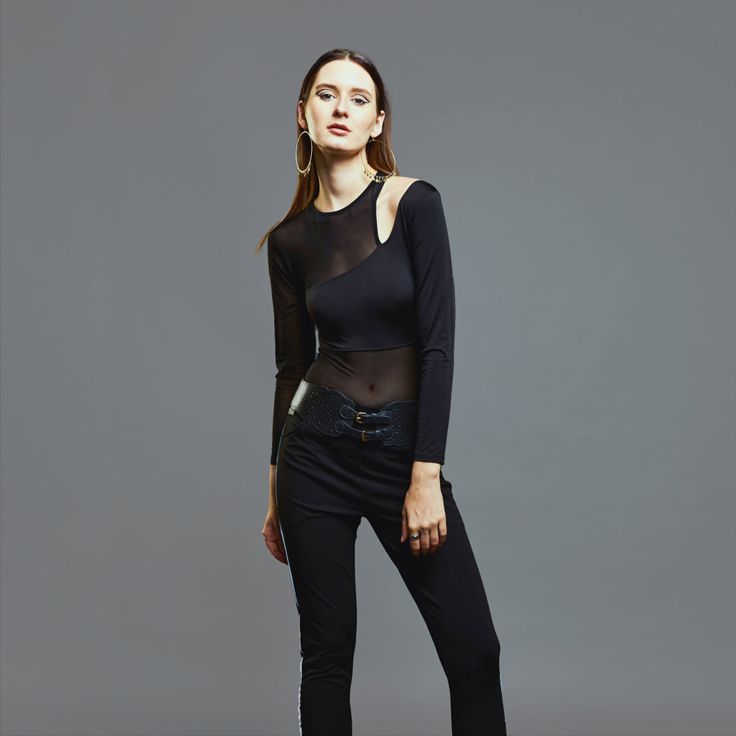 a woman in a black dress and a black dress