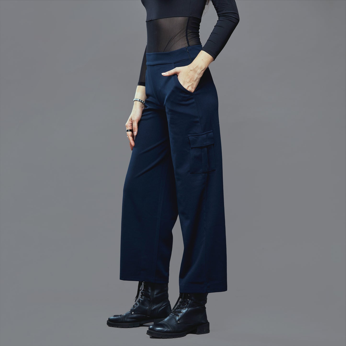 a man standing on top of a skateboard