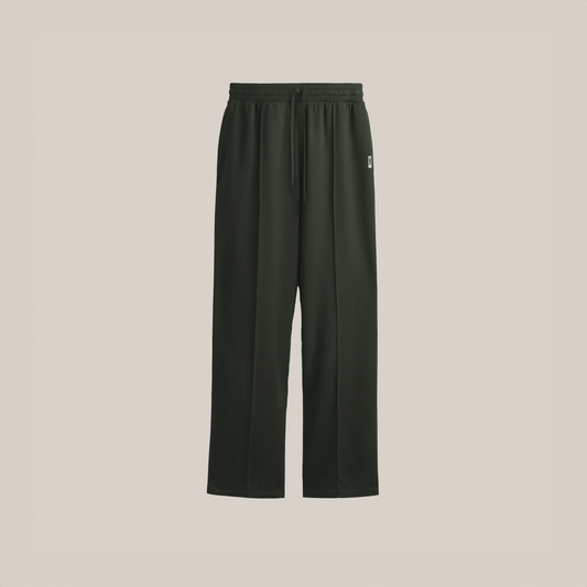 Forest green wide-leg pants with an elastic drawstring waistband and a small square logo on the upper left side.