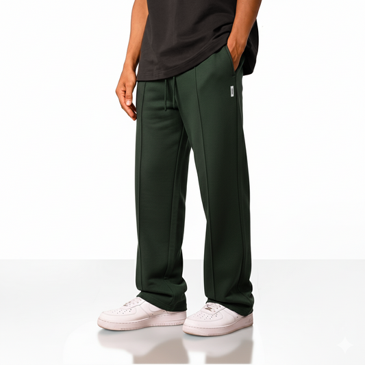Forest green wide-leg pants with an elastic drawstring waistband and a small square logo on the upper left side.