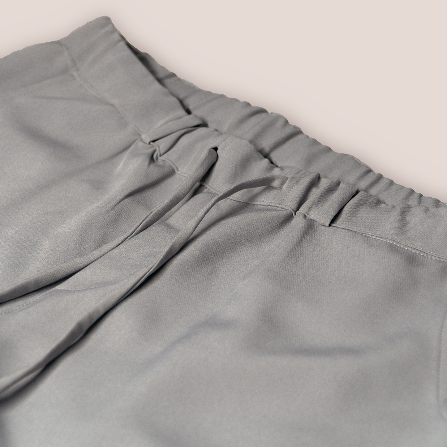 Featuring two side and two back pockets with an elastic waist band with drawstrings.
FABRIC – Twill Fabric