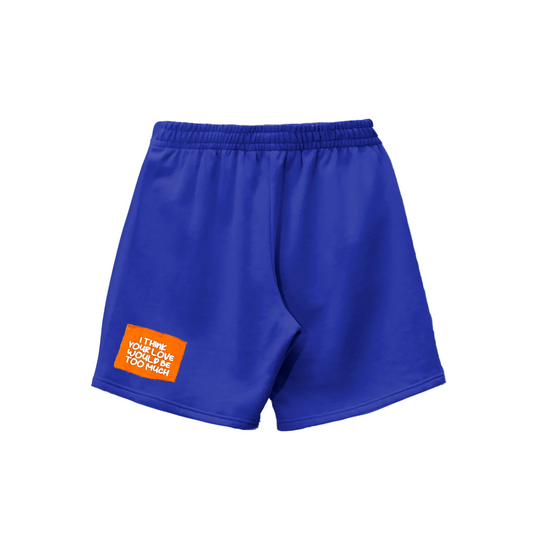 Blue shorts featuring a white daisy design on the front.