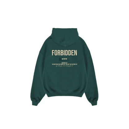 Dark green hoodie shown from the back featuring bold “FORBIDDEN” text, a small “For the Few” label, and a minimalist inspirational slogan printed at the center.