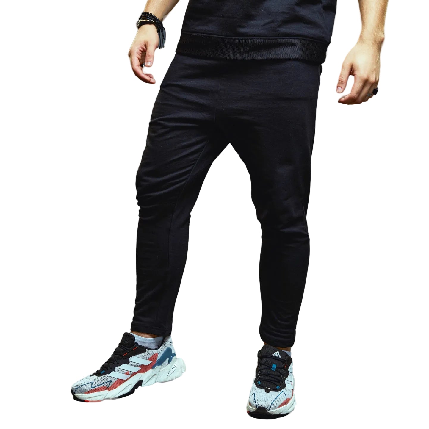 a man is standing on a skateboard 