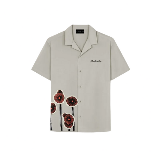 A casual shirt decorated with a colorful poppy print, showcasing floral design.