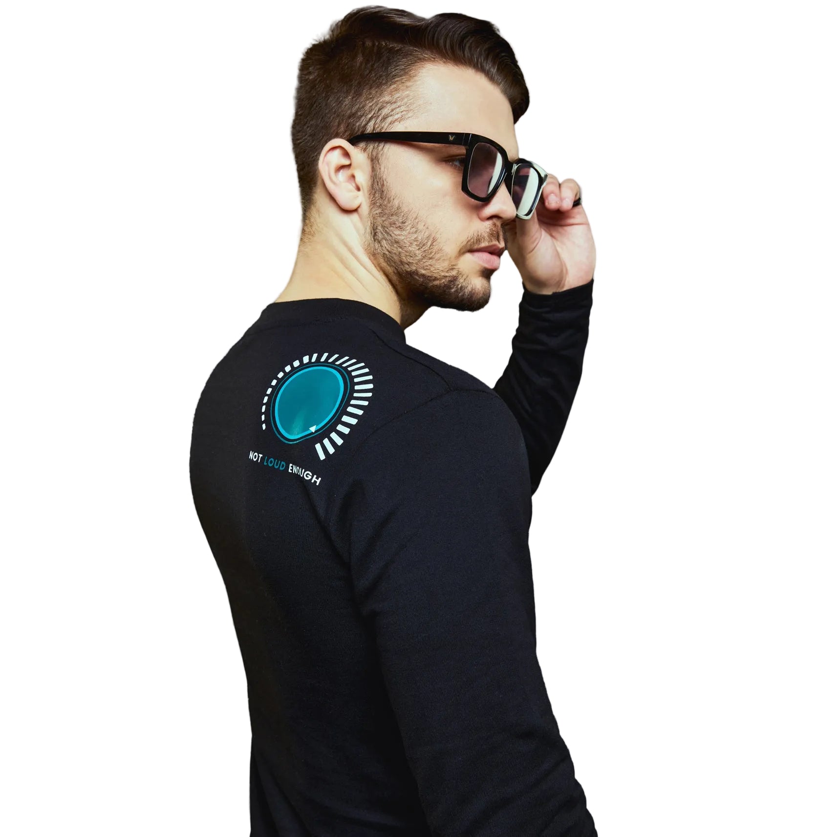 a man in glasses is talking on a cell phone 