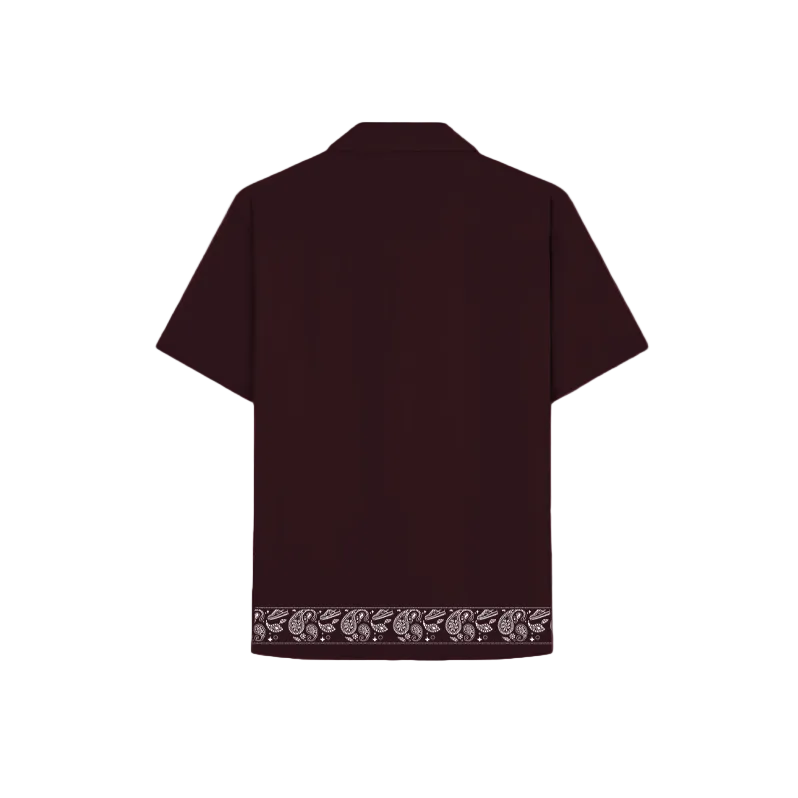 Maroon shirt with stylish embroidered accents, showcasing detailed craftsmanship.