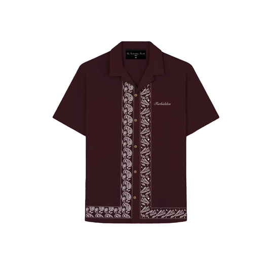 Maroon shirt with stylish embroidered accents, showcasing detailed craftsmanship.
