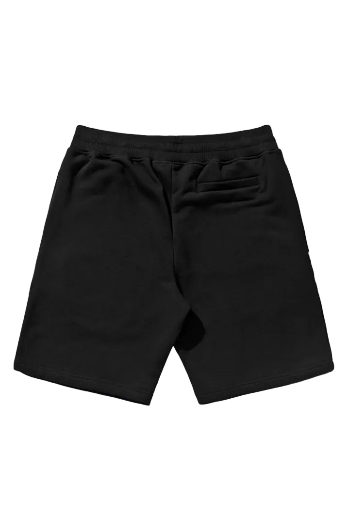 a black and white photo of a black purse 