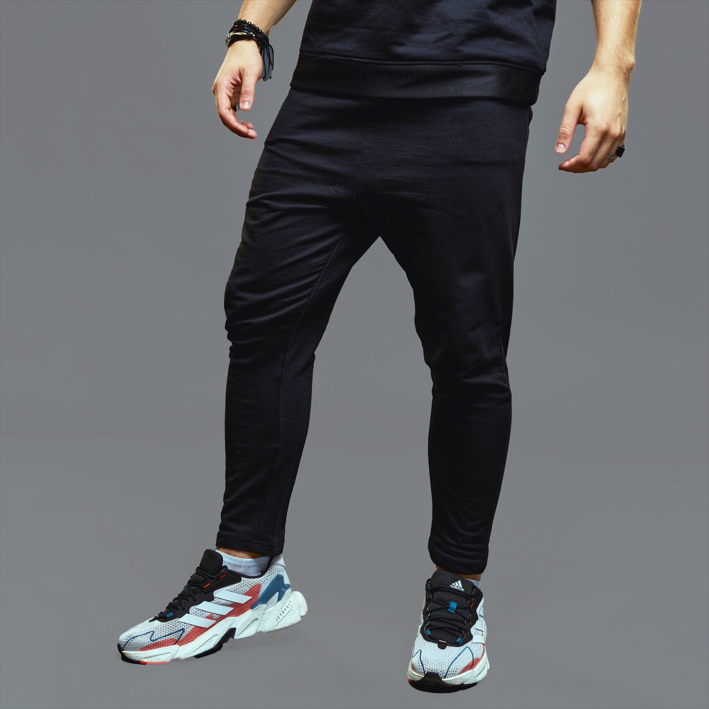 a man is standing on a skateboard 