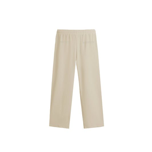 Relaxed fit 'Unfollow Me' ribbed straight pants with an elasticated waistband and clean hem.