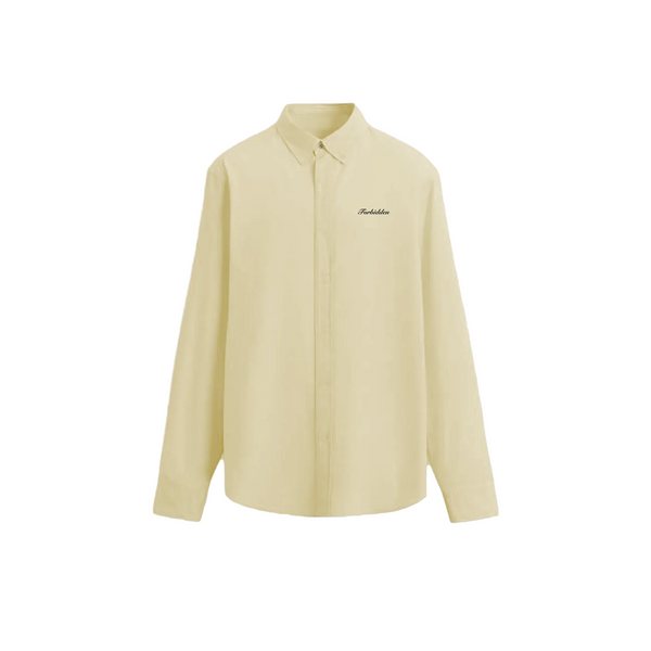 A light yellow long-sleeve button-up shirt with "Forbidden" embroidered in black on the chest, set against a plain beige background. Simple and elegant.