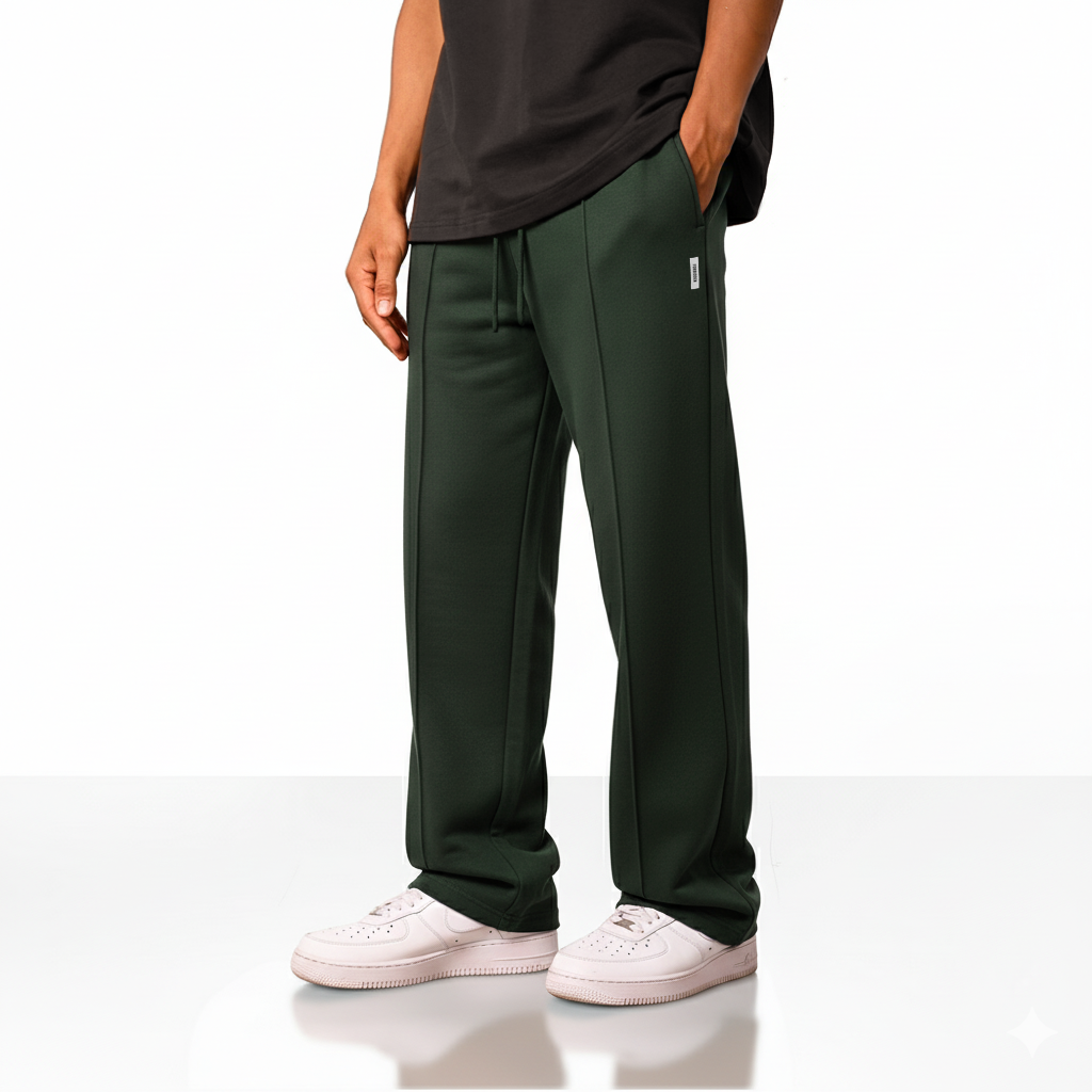 Forest green wide-leg pants with an elastic drawstring waistband and a small square logo on the upper left side.