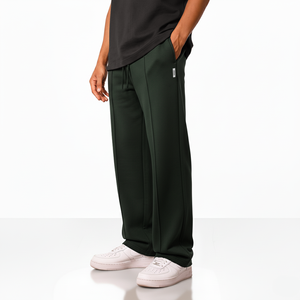 Forest green wide-leg pants with an elastic drawstring waistband and a small square logo on the upper left side.