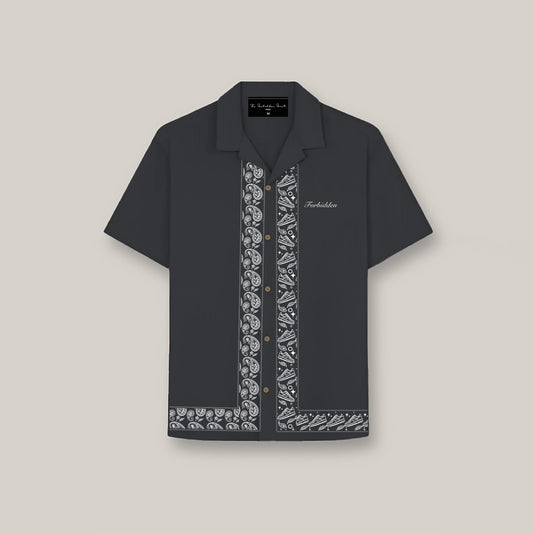 The design incorporates subtle sneaker motifs within the intricate curves of the paisley pattern reflecting a perfect balance between heritage and modern style. The juxtaposition of ethnic detailing with street culture elements brings a fresh, dynamic energy to the print, making it a beautiful representation of the versatility and artistic depth in contemporary streetwear fashion.The&nbsp;Shirt is made of High-Quality Armani fabricPoly Cotton Twill Blend